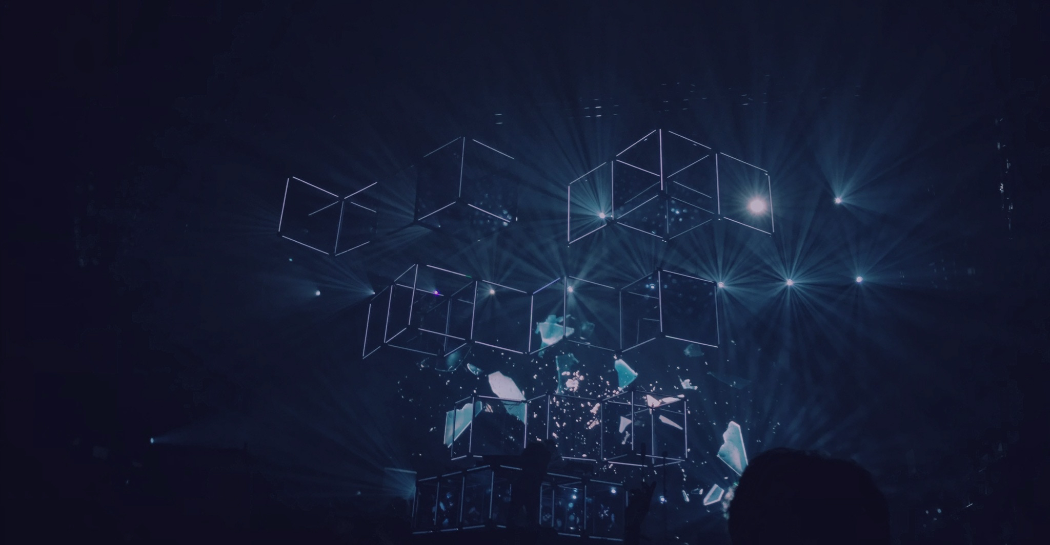 Blue illuminated geometric installation from the original Priveon website